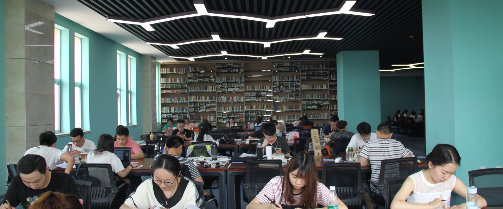 Students studying in a university library